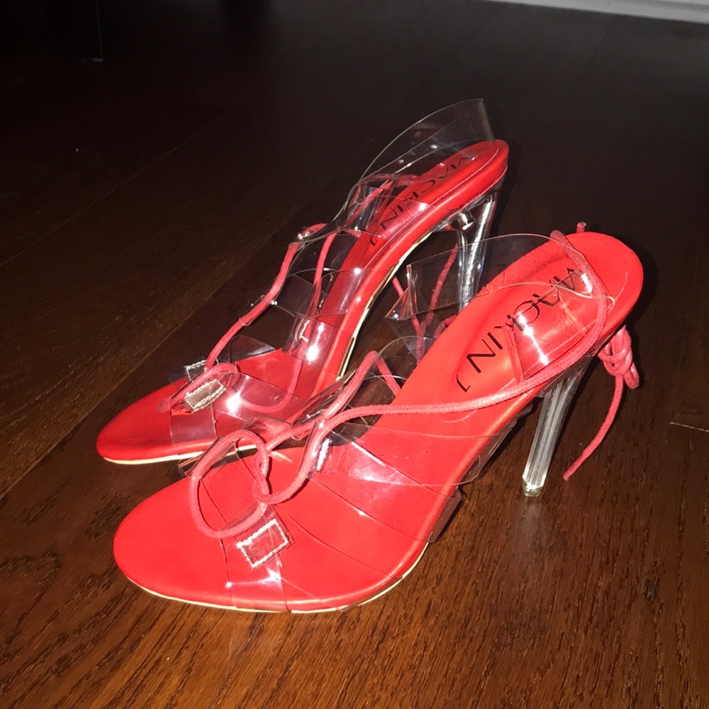 Women’s clear and red high heeled tie up sandals